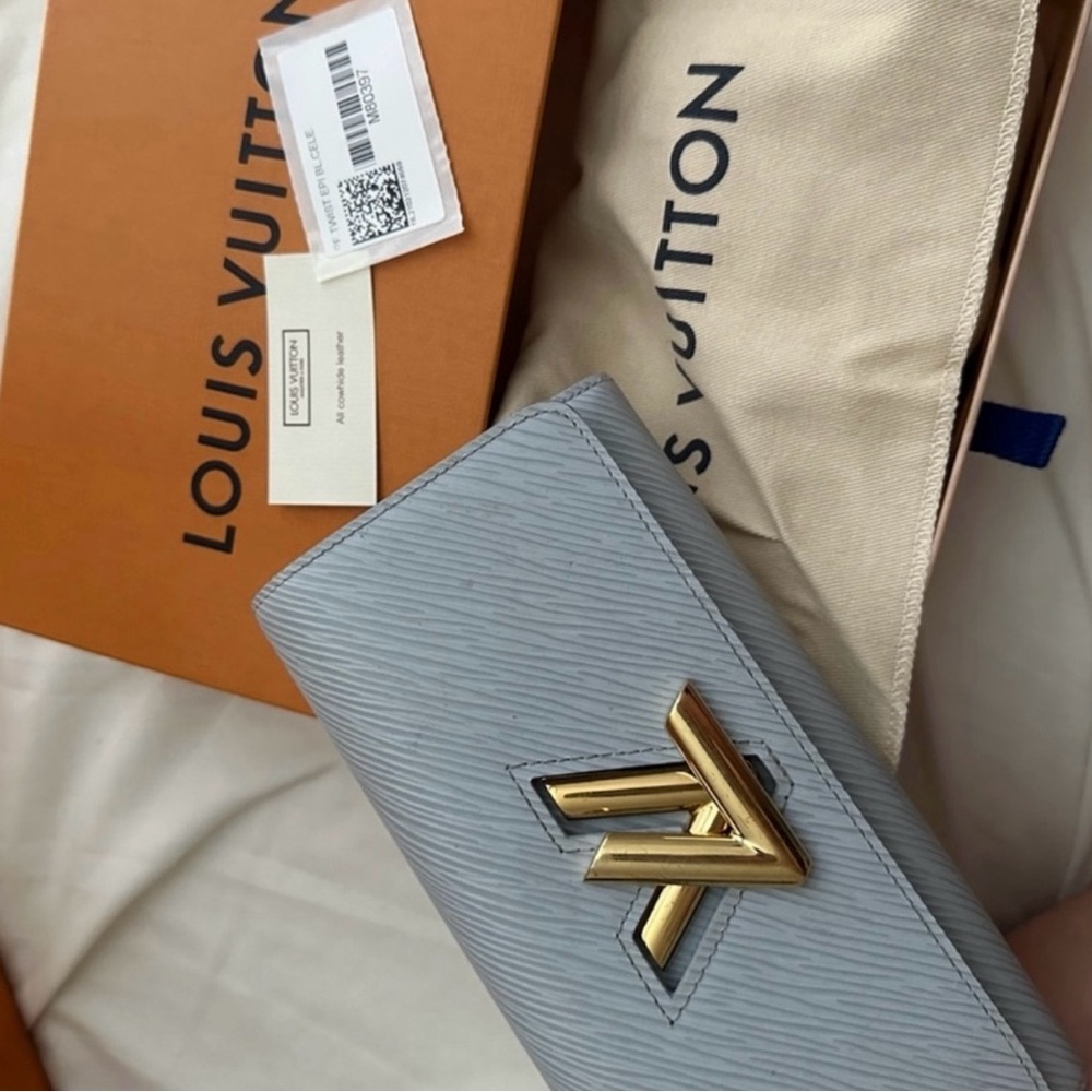 Louis Vuitton Light Blue Clutch with Gold Logo - Picture 2 of 4